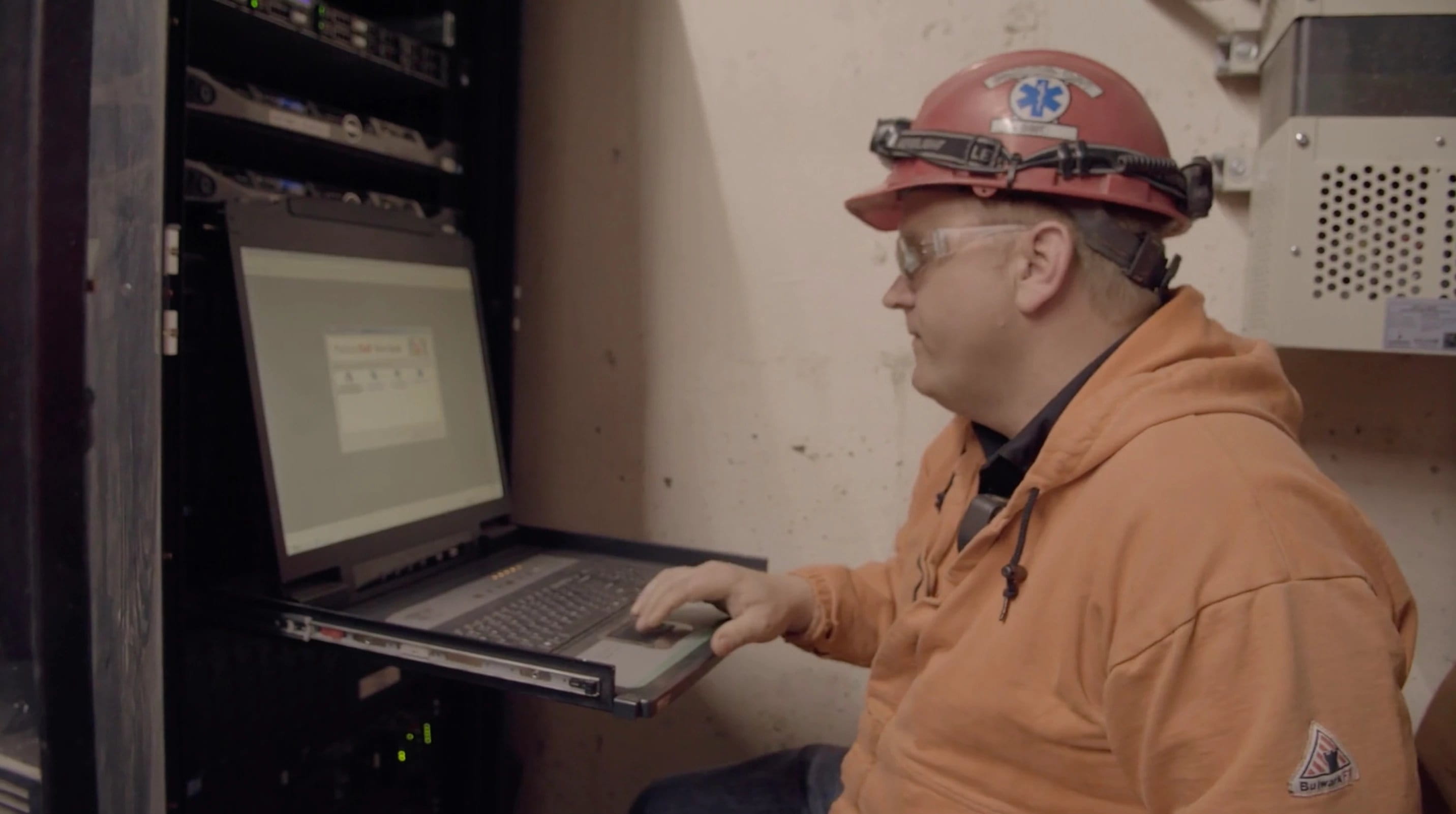 Factory worker on computer network