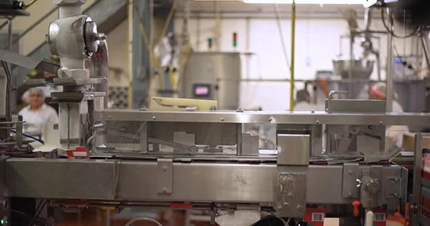 Picture of a food processing line in a manufacturing facility.