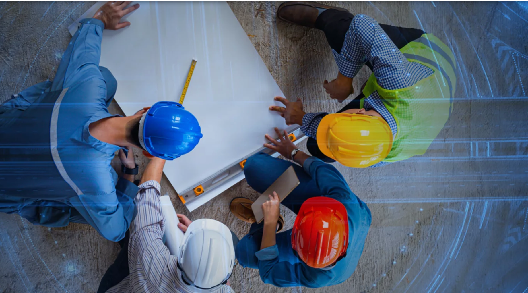 Rockwell whitepaper workers looking at blueprint photo